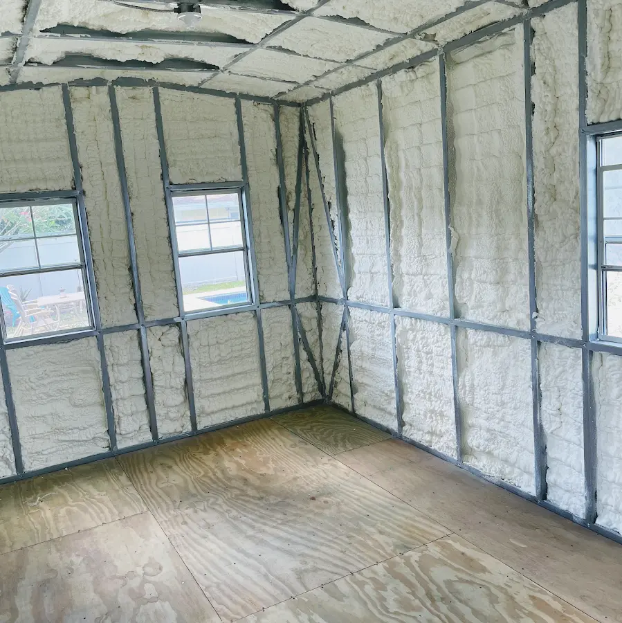 Closed-cell spray foam insulation applied to wall cavities in a residential project in Valley Center
